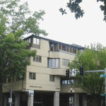 Thumbnail of commercial apartment building with gutters and trim