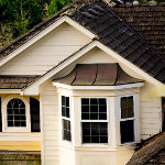 Curved copper gable with moulding