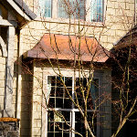 Curved copper gable 