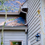 Continuous residential gutter and downspout allowing runoff for a multi level house