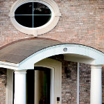 Curved residential entryway roof thumbnail