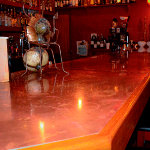 High gloss copper counter tops for bar like atmosphere