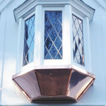 Highly slanted copper roofing for a bay window